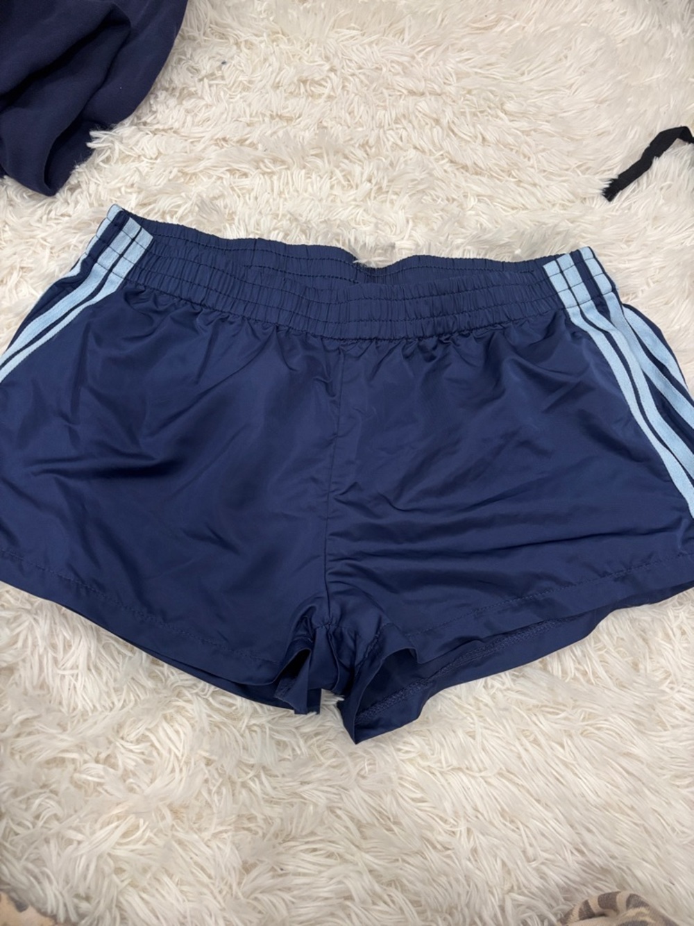 Edikted Navy Athletic Shorts with Light Blue Side Stripes